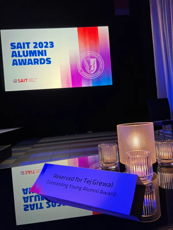 A reserved place card for Tej Grewal at the SAIT 2023 Alumni Awards